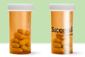 Two prescription drug bottles—one blank and one with a brand name printed on the outside